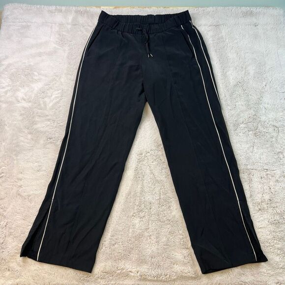 Lululemon On The Right Track Womens Pants Black Loose Fit Slit Hem Size 10 - Picture 2 of 11